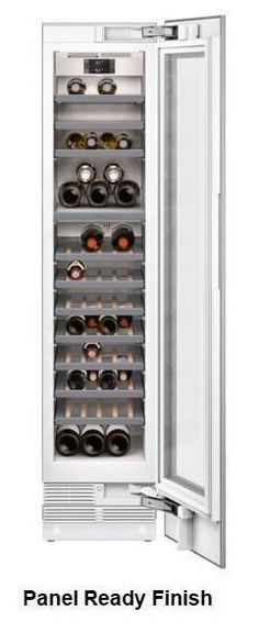 an image of a refrigerator with its door open and wine bottles in the bottom drawer