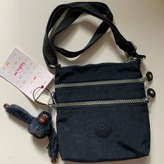 Size: 6.25” X 6.75” X 1.5” Model: Alvar Xs Brand New With All The Tags Attached. Ac7098 Color 414 Blue Shoulder Bag With Zipper Closure, Ideal As Gift, Blue Shoulder Bag With Zipper Closure As Gift, Blue Shoulder Bag With Cell Phone Pocket, Blue Shoulder Bag With Cell Phone Pocket For Gift, Blue Bag With Zipper Pocket For Gift, Blue Bag With Zipper Pocket As Gift, Kipling Crossbody Bag, Mini Monkey, Hip Pouch