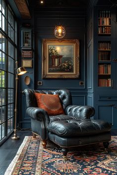 a living room filled with furniture and bookshelves next to a large painting on the wall