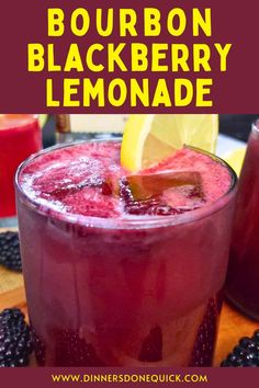 the bourbon blackberry lemonade is garnished with fresh blackberries