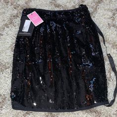 Sparkly Black Skirt Brand New Trendy Black Mini Skirt For Party Season, Glamorous Black Skirt For Date Night, Black Sequined Mini Skirt For Spring, Black Mini Skirt For Evening Parties, Trendy Black Party Mini Skirt, Black Mini Skirt For Evening Party Season, Chic Black Sequin Skirt, Black Pencil Skirt For Party, Black Mini Skirt For Party Season