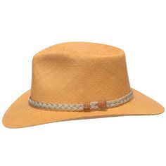 Authentic Aficionado is a safari-style fedora with a reinforced hand-blocked teardrop crown that features a wide fixed brim, padded twill sweatband, and a rustic braided rope hatband. The brim is fixed down in the front and back while containing a wire to hold its shape. This item is a genuine Panama Hat handwoven in Ecuador. Material: 100% Toquilla Straw Brim: 3" fixedCrown: 4 1/4" teardropHatband: 5/8" braided ropeClimate: Sun Handwoven in Ecuador. Hand-finished in the US. Measurements are app Brown Braided Panama Hat With Short Brim, Brown Braided Short Brim Panama Hat, Curved Brim Safari Fedora For Travel, Casual Braided Brimmed Panama Hat, Safari Style Fedora With Curved Brim For Travel, Casual Brown Braided Fedora, Brown Braided Panama Hat With Curved Brim, Safari Fedora With Curved Brim For Travel, Travel Safari Fedora With Curved Brim