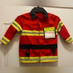 a fireman's jacket hanging on the wall