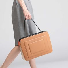 Designed in a silhouette inspired by Art-Deco style, this bag is expertly crafted from Italian calf leather with microsuede lining. Packs a ton of features in a slim, compact space so you can carry your office life in the bag — including a 16” Macbook Pro. It has additional two tight slots on the front that you can fit your notebook, phone or tablet. Crafted from Italian cow leather. Soft coating zippers ensure your laptop won't get scratched. h:28 X w:39.5 X d:7 cm (11 X 15.5 X 2.75 in) Handle Office Life, Dark Outfits, Bag Shop, In The Bag, Business Bag, Secret Sale, New Launch, Art Deco Inspired, Nice Leather