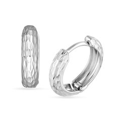 Add a touch of shine and shimmer to any look with these diamond-cut huggie hoop earrings. 14K white gold Each huggie hoop features an allover diamond-cut detailing that catches and reflects light 12.4 x 3.2mm Hinged backs White Gold Tarnish Resistant Huggie Earrings For Anniversary, White Gold Huggie Jewelry With Diamond Cut, Silver Diamond Cut Huggie Jewelry, Silver Huggie Jewelry With Diamond Cut, Minimalist Round Diamond Cut Huggie Earrings, Minimalist Diamond Cut Huggie Earrings, Minimalist Silver Huggie Earrings With Diamond Cut, Minimalist Round Huggie Earrings With Diamond Cut, Modern Round Diamond-cut Huggie Earrings