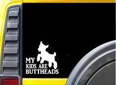 i love my kids sticker on the back of a yellow car that says, i love my kids