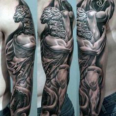 a man's arm with tattoos on it and an image of a statue in the middle