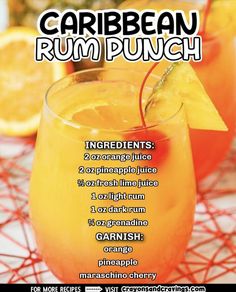 an advertisement for a rum punch with oranges and garnish on the side