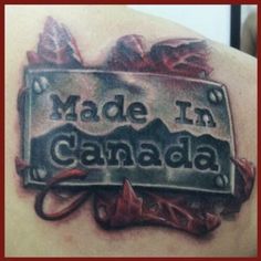 a tattoo with the words made in canada on it