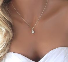 What better way to say "thank you" to your bridesmaids than to gift them with this gorgeous teardrop cz necklace. Perfect for not just the big day but year round. - Made with 14k gold filled, rose gold filled or sterling silver chain and components- A high quality delicate link chain- The CZ teardrop stone is gold, rose gold or silver plated (nickel and lead free)- Necklace is shown at 17"- Handmade Diamond Wedding Necklace, Necklace For Bride, Prom Necklace, Crystal Wedding Necklace, Diamond Necklace Wedding, Bride Elegant, Prom Necklaces, Bridesmaid Thank You, Diamond Necklace Designs