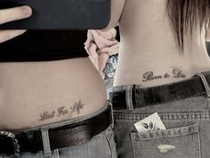 two women with tattoos on their stomachs, one has the words just for life