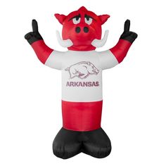 an inflatable red and white mascot with horns on it's head, arms outstretched