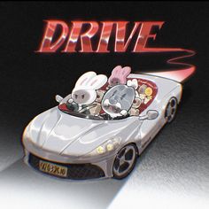 a car with some cartoon characters in it driving down the road, and an advertisement that says drive