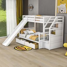 a child's bedroom with bunk beds, slide and storage drawers on the floor