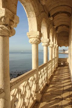 an old building with pillars and arches overlooking the ocean royalty images, stock photos & more