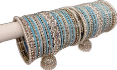 Traditional Blue Bangle For Weddings, Traditional Blue Wedding Bangle, Blue Bangle For Weddings And Festivals, Festive Blue Round Bangle, Blue Bangle For Festivals And Party, Blue Bangle For Party And Festivals, Blue Hand Set Bangle For Wedding, Blue Hand-set Bangle For Wedding, Jhumka Bangles