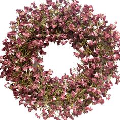 a wreath with pink flowers hanging from it