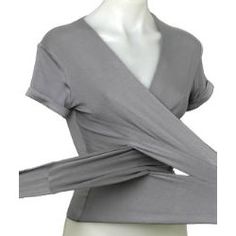 a mannequin wearing a gray top with long sleeves on it's arms