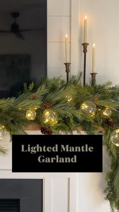 lighted mantle garland with candles and pine cones