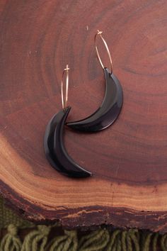 Carved obsidian crescent moons hanging from simple sterling silver or gold filled hoops. Gorgeous unique statement earrings! // size // - earrings measure 2.25 inches long, hoops are about 20mm Crescent Moon Earrings, Gold Filled Hoops, Earrings Hoop, Moon Jewelry, Moon Earrings, Jewelry Earrings Hoops, Crescent Moon, Sterling Silber, Crescent