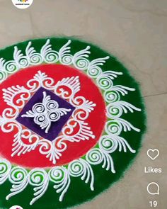 a colorful rangdi design on the floor