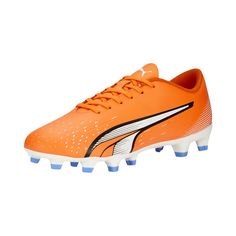 an orange and white soccer shoe