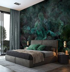 a large bed sitting next to a window in a room with green walls and curtains