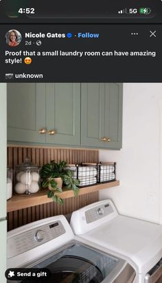 a white washer sitting next to a dryer in a room with green cabinets