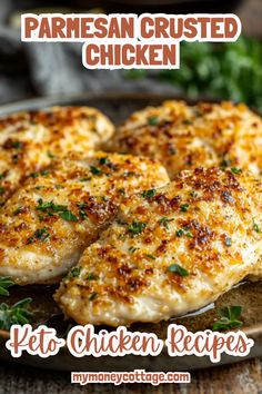 some chicken is on a plate with parmesan crusted chicken in the background