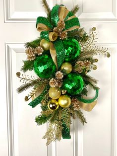 a door decorated with green and gold ornaments