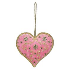 a pink heart shaped ornament hanging from a string on a white background with gold trim