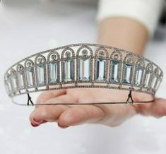 This tiara is beautifully silver-plated and encrusted with sparkling clear genuine zirconium stones of various sizes and Aquamarine. The many zirconium And Aquamarine Stones make this crown sparkle in any light. This piece is versatile and compliments many different styles, can be worn for Weddings, Bridal Showers, Birthdays, Baby Showers, Graduation, Maternity Shoots or any special occasions! Handmade Bridal Tiaras/Crown Made to Order Diamond Weight -- 8.54ct Diamond -- American Diamonds/Zircon Handmade Tiaras, Royal Tiaras, Diamond Tiara, Crown Tiara, Diamond Crown, Diamond Brooch, Royal Jewels, Aquamarine Stone, Wedding Tiara