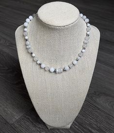 This beautiful choker was hand designed with all moonstone beads and faceted hematite spacers. The milky moonstone beads are rainbow moonstone in 8 and 6 mm rounds, and the clearer more flashy beads with the most gorgeous blue flash are the high grade moonstone beads. These include rounds and faceted rondelles.  Secured with a lobster clasp, This necklace is 16 inches and length and extendable to 19 inches to fit most everyone.  Moonstone is the perfect stone for June babies and Geminis. Moonstone is also an amazing gem for getting in tune with our creative, intuitive feminine energies. The tranquil energy of moonstone invites creativity and restoration, easing negative emotions and tensions in everyday life. I personally chose to wear moonstone daily with my other jewelry :) Adjustable Moonstone Jewelry With Round Beads, White Adjustable Crystal Necklaces With Round Beads, Adjustable White Crystal Necklaces With Round Beads, White Crystal Necklace With Faceted Beads And Adjustable Fit, Adjustable White Crystal Necklace With Faceted Beads, Elegant Moonstone Beaded Necklaces, Elegant White Moonstone Beaded Necklaces, Elegant White Moonstone Beaded Necklace, Adjustable Moonstone Beaded Jewelry, 8mm