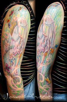 an angel with flowers and butterflies on her arm, next to another tattoo design that appears to be done by the same artist