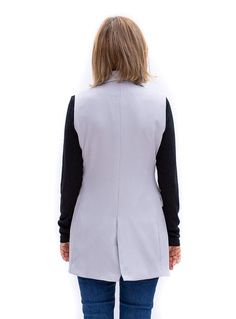 Here is our chic and trendy Silver Double Breasted Sleeveless Blazer Vest Long semi shaped body in silver crepe fabric Fabric content: 100% Microfiber Shawl collar with double breasted front closure Two welt pockets with flaps in the front Six big black buttons with keyhole buttonholes Fully lined in silver lining Center back vent CB length from neck to bottom 29" Dry clean only Sleeveless Gray Outerwear For Work, Fitted Vest With Snap Buttons For Work, Sleeveless Blazer Vest, Sleeveless Blazer, Just Style, Blazer Vest, Silver Lining, Crepe Fabric, Black Button