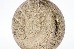 "This stunningly engraved pocket watch is made in 14K gold and has a porcelain dial. On the front is engraved \"EAL\" in a oval style shield with sparrows nesting on either side.Leaves, twirling ferns, and intricate hand engraving decorate this beautiful watch case. On the back is an engraved sail boat with daisies, another nested sparrow, and other floral pieces.Around the dial face is milgrain detail that makes this over the top. Please note that the dial face is slightly cracked on the lower Engraved Yellow Gold Pocket Watch For Wedding, Luxury Engraved Pocket Watch For Anniversary, Heirloom Engraved Pocket Watch For Wedding, Luxury Gold Engraved Pocket Watch, Victorian Gold Engraved Pocket Watch, Antique Gold Engraved Pocket Watch, Luxury Engraved Pocket Watch Collectible, Elegant Engraved Collectible Pocket Watch, Heirloom Engraved Pocket Watch Collectible