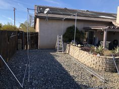 the back yard is empty and ready to be used as a planter for succulents