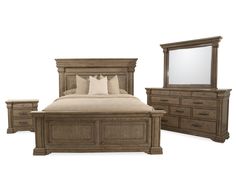 a bed, dresser and mirror are shown in this image with no people around it