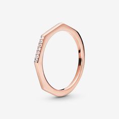 Add a bit of industrial edge to your look with this Multifaceted Ring in 14k rose gold-plated metal. Inspired by geometric shapes and modern minimalistic style, this ring stands out with five faceted angles on one half and a semi-circle on the other. Thin and elegant, it’s finished in polished metal and features a row of clear cubic zirconia on one facet. The stackable design makes it perfect for wearing alone or layering with other rings in mixed metals. Pandora Multifaceted Ring - Final Sale - Daisy Flower Crown, Silver Wedding Gifts, Rings Pandora, Rings Rose Gold, Pave Setting Ring, Princess Tiara, Pandora Rings, Crown Ring, Sparkling Rings