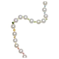 The classic white pearl necklace with 6mm pearls, sparkling multicolor sapphires and other gemstones! Colors follow the pattern of the rainbow, hand knotted on multicolor silk thread, finished with an 14k solid gold clasp. • Highest quality pearls • Perfect round and shiny luster • hand carved sparkling pink sapphires • hand carved sparkling tourmalines • hand carved sparkling tanzanite • hand carved sparkling sky blue Apatite • 14K solid gold clasp • Hand knotted on multicolor silk that follow Rainbow Sapphires, White Pearl Necklace, Blue Apatite, Silk Thread, Pink Sapphire, Classic White, Pearl White, Handmade Necklaces, Tourmaline