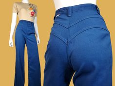 "DITTOS...FEEL THE FIT! The pants that every young gal in the 70s could NOT live without! They came in a full range of colors & most people who had them can tell you exactly which colors they had. Dittos were available in different stitching designs like saddle backs, bare backs, & side saddles & were one of the first lines of jeans designed for a woman's figure. They were dubbed 'The Hottest Jeans In America' & had a truly memorable edgy ad campign. This pair is a dark navy blue with an eye-cat Ditto Jeans Vintage, Retro Style Denim Blue Cotton Pants, Retro High Waist Cotton Flare Jeans, Vintage Blue Mid-rise Bottoms, Retro Denim Blue Pants With Belt Loops, Retro Fitted Blue Flare Jeans, Fitted Blue 1970s Style Bottoms, 1970s Style Fitted Blue Bottoms, Fitted 1970s Style Blue Bottoms