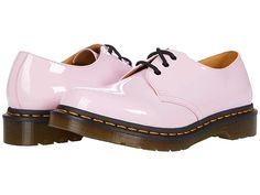 Dr. Martens 1461 Patent - Women's Boots : Pale Pink : The Dr. Martens 1461 Patent lace-up oxfords add a modern touch to this classic look by adding a glossy patent finish for a completely eye-catching update. Classic three-eye lace-up made from fine-grained leather that is coated for a high-shine, glossy finish. Goodyear® welt construction where the upper and sole are heat sealed and sewn together for excellent flexibility and durability. Smooth leather lining for a comfortable in-shoe feel. Lig Trendy Lace-up Patent Leather Oxfords, Modern Patent Leather Lace-up Oxfords, Classic Patent Leather Oxfords For Spring, Trendy Patent Leather Oxfords For Formal Occasions, Dr Martens Style, Martens Style, Stella Mccartney Elyse, Goodyear Welt, Dr. Martens