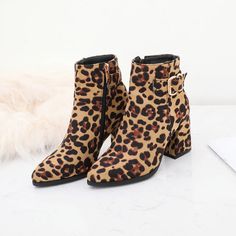 Product category: fashion boots Upper material: suede Sole Material: Rubber Applicable gender: female Style: European and American Toe shape: pointed Heel shape: thick heel Heel height: high heel (6-8CM) Popular boots: Martin boots Popular element: belt buckle Function: Increase Tube height: low tube Thickness: ordinary thick Wearing style: side zipper Pattern: Leopard Popular Boots, Buckle Booties, Wine Tote Bag, Cool Sleeves, Sac Lunch, Female Style, Chunky Heels Boots, Pointed Heels, Thick Heel