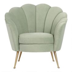 a light green chair with gold legs on a white background