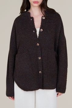 wrap yourself in warmth and style with this dark chocolate bouclé button down cardigan. the rich, textured bouclé fabric adds cozy sophistication to your fall and winter wardrobe, while the button down front offers versatile styling options. perfect for layering or pairing with your favorite jeans, this cardigan brings a polished yet relaxed look to any outfit. the deep chocolate hue is a seasonal staple, making it a go-to for casual days or festive gatherings. Button Down Cardigan, Sweaters Oversized