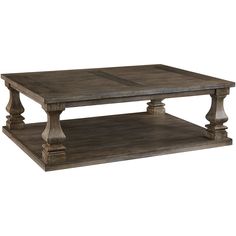 a coffee table with two wooden posts on top