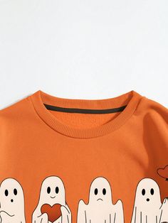 Stay snug this season with this Halloween-inspired thermal-lined sweatshirt. Crafted from soft, comfortable fabric, this on-trend piece is designed with a timeless print and classic long-sleeve construction to ensure you stay cozy through fall. Color : Burnt Orange Style : Casual Pattern Type : Heart Pattern Type : Halloween Type : Pullovers Neckline : Round Neck Sleeve Length : Long Sleeve Sleeve Type : Regular Sleeve Length : Regular Fit Type : Loose Fabric : Slight Stretch Material : Knitted Fall Cartoon Print Sweatshirt For Streetwear, Trendy Fall Sweatshirt With Character Print, Trendy Character Print Sweatshirt For Fall, Fall Streetwear Sweatshirt With Cartoon Print, Fall Cartoon Print Streetwear Sweatshirt, Red Cartoon Print Sweatshirt For Fall, Orange Letter Print Sweatshirt For Winter, Orange Ribbed Cuffs Sweatshirt For Fall, Trendy Orange Sweatshirt For Fall