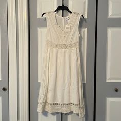 Nwt Nu New York Bohemian White Midi Dress With Lace Cutout Trim. Bought From Boutique In Soho Nyc. A Store That Had Amazing Trendy And Unique Items That I Shipped At Regularly, Was Sad To See It Close Due To Pandemic. They Used To Sell On Shoptique Online Store Too. Summer Perfect For Hot Day. I Am Petite And Typically Wear Xs And Snall But Bought The Medium Because I Liked It A Little Oversized. Fits 34d V-Neck, Crossover Zip Back Sleeveless Medium See All Pics For Measurements And Material Inf Bohemian White Midi Dress With Lace Trim, Soho Nyc, Lace Cutout, White Midi, York Dress, Hot Day, Trim Color, Dress With Lace, White Midi Dress