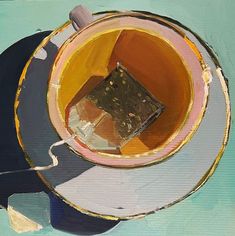 a painting of a cup and saucer on a blue tablecloth with gold foil