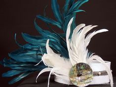 Tahitian side headpiece. White fabric base with gray trim and freshwater pearls and an xlg abalone shell. Hawaiian Costume, Hawaiian Goddess, Tahitian Costumes, Tahitian Dance, Solo Costume, Competition Costumes, Grey Trim, White Feathers, Ocean Themes